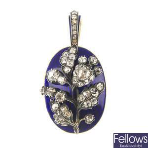 A diamond and enamel pendant.