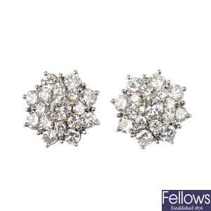 A pair of diamond cluster ear studs.