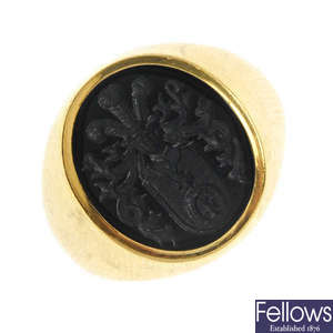 An 18ct gold onyx intaglio ring. 