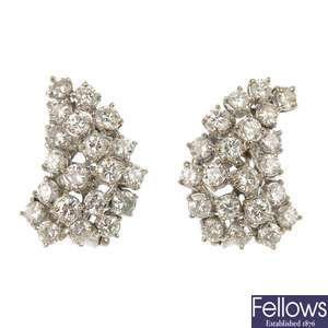 A pair of mid 20th century diamond earrings.