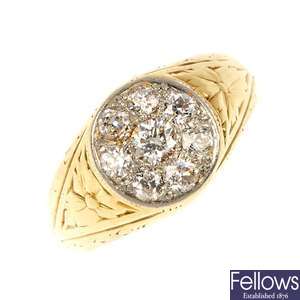 A gentleman's mid 20th century 18ct gold diamond cluster ring.