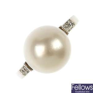 A mid 20th century platinum cultured pearl and diamond ring.
