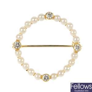 An 18ct gold diamond and cultured pearl brooch.