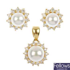 An 18ct gold cultured pearl and diamond cluster pendant and similar earstuds.