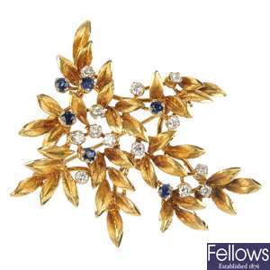 A 1970s 18ct gold sapphire and diamond foliate brooch.