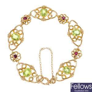 An early 20th century 15ct gold peridot and garnet bracelet.