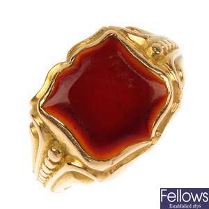 A late 19th century 15ct gold hardstone signet ring.