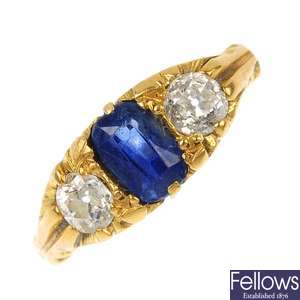 A late 19th century gold sapphire and diamond three-stone ring.