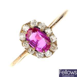 A mid 20th century gold ruby and diamond cluster ring.
