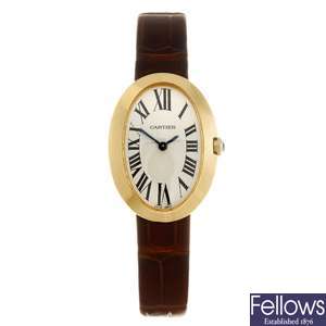 An 18k gold quartz Cartier Baignoire wrist watch.