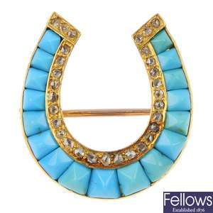 A late 19th century gold turquoise and diamond horseshoe brooch.
