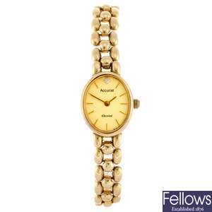 A 9ct gold quartz lady's Accurist bracelet watch.