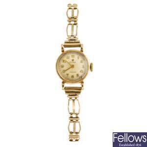 A 9ct gold manual wind lady's Cyma bracelet watch.
