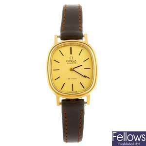 A gold plated quartz lady's Omega De Ville wrist watch.