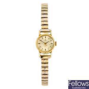A gold plated manual wind lady's Omega bracelet watch with a 9ct gold lady's Frey bracelet watch.