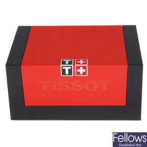 A group of complete Tissot watch boxes.