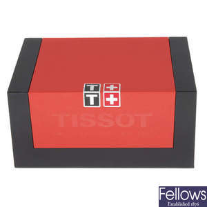 A group of complete Tissot watch boxes.