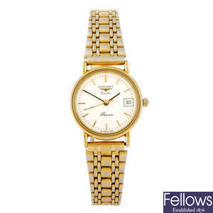 LONGINES - a lady's Presence bracelet watch and two 9ct gold bracelet watches.