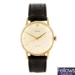 A 9ct gold manual wind gentleman's Rolex Precision wrist watch on leather strap.
