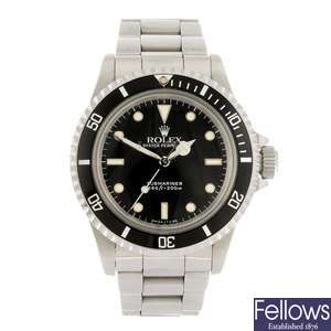 A stainless steel gentleman's Rolex Oyster Perpetual Submariner bracelet watch.
