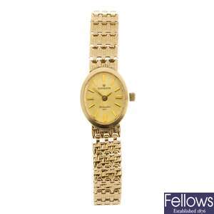 (119185416) A 9k gold quartz lady's Sovereign bracelet watch.