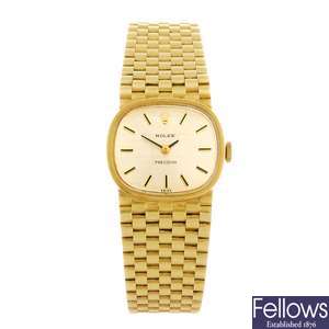 A 14ct gold manual wind lady's Rolex Precision bracelet watch.