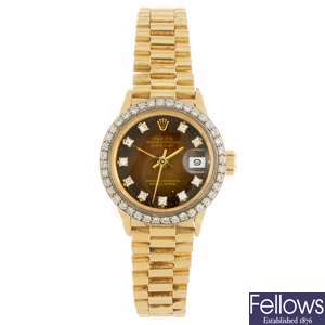 (606009065) A 18k gold automatic lady's Rolex Datejust bracelet watch.