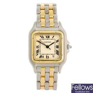 (134180940) A bi-metal quartz Cartier Santos bracelet watch.