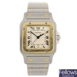 (303099842) A bi-metal quartz Cartier Santos bracelet watch.