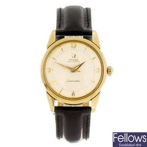 An 18ct gold automatic gentleman's Omega Seamaster wrist watch.