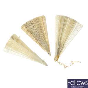 A selection of late 19th century ivory and bone pieces and three fans.