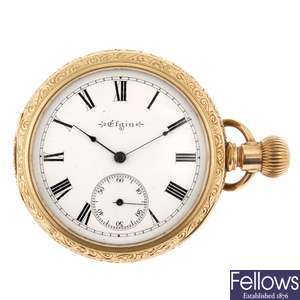 A gold plated keyless wind open face pocket watch by Elgin with two other pocket watches.