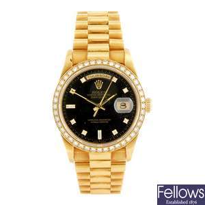 An 18k gold automatic gentleman's Rolex Day-Date bracelet watch.