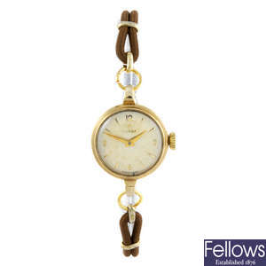 OMEGA - a lady's 9ct yellow gold wrist watch.