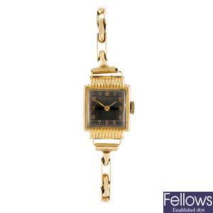 An 18k gold manual wind lady's Ancre bracelet watch.