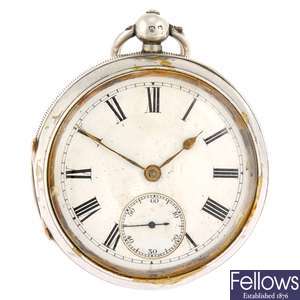 A silver key wind open face pocket watch and chain.