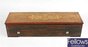 A 19th century inlaid rosewood cased cylinder musical box