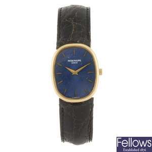An 18k gold manual wind Patek Philippe Ellipse lady's wrist watch.