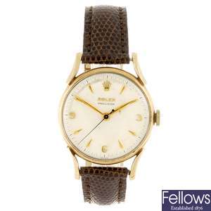 A 9k gold manual wind gentleman's Rolex Precision wrist watch.