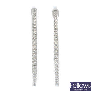 BOODLES - a pair of 18ct gold diamond ear hoops.