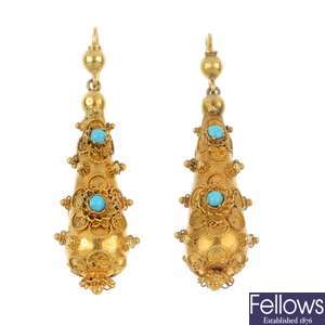 A pair of late 19th century gold turquoise ear pendants.