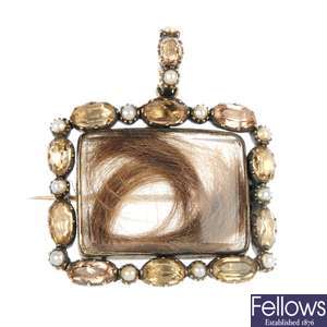 A mid 19th century gold citrine and split pearl pendant.