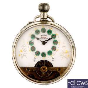 A base metal keyless wind open face eight day pocket watch by Capital.
