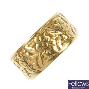 A mid 20th century 18ct gold floral band ring.