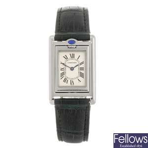 (940002584) A stainless steel quartz Cartier Tank Basculante wrist watch.