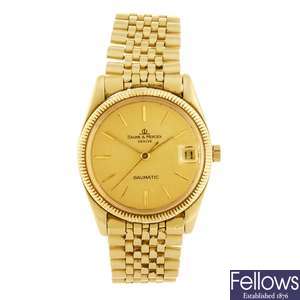 (401055103) An 18k gold automatic gentleman's Baume & Mercier Baumatic bracelet watch.