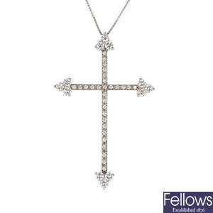 DAVID MORRIS - an 18ct gold diamond cross pendant.