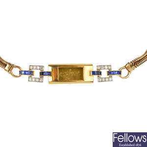  A 1930s Art Deco 18ct gold diamond and sapphire watch case. 