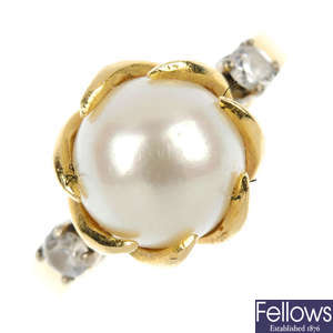 A cultured pearl and paste dress ring. 