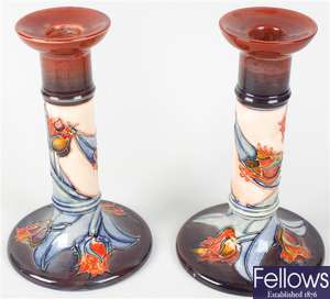 A pair of modern Moorcroft pottery 'Red Tulip' patteren candlesticks